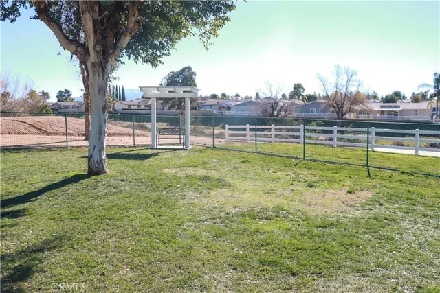 a view of swimming pool with outdoor seating