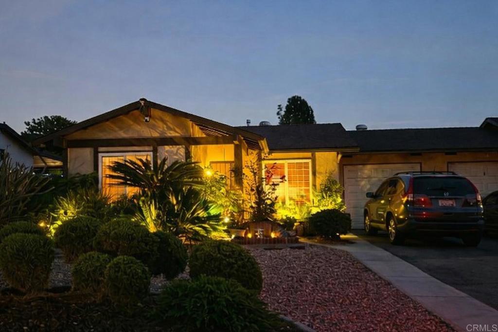 4699 Mystik Road Oceanside, CA 92056 - Photo 1 of 1 a view of a car park in front of a house