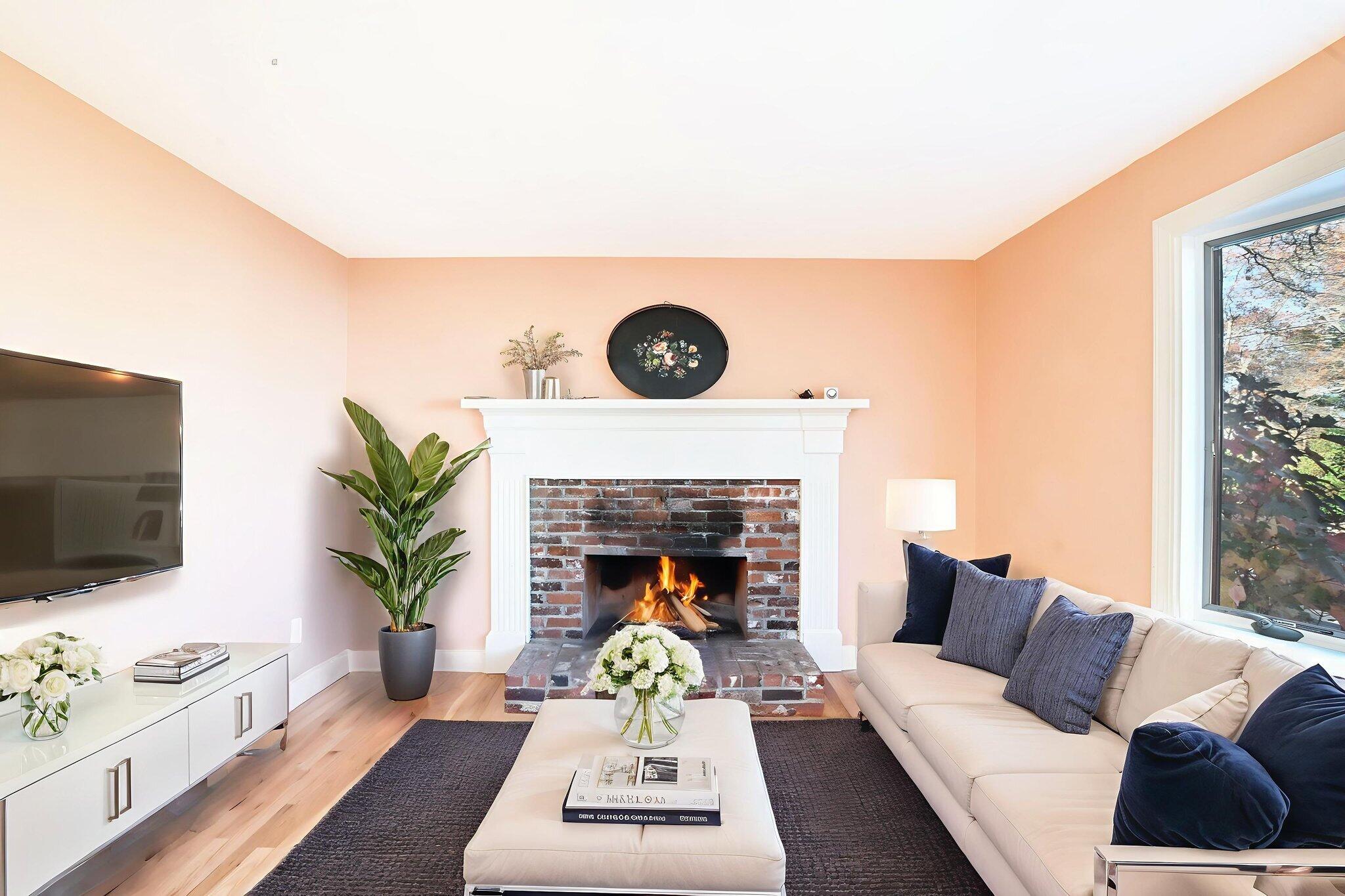 12 Crowell Road Sandwich, MA 02563 - Photo 11 of 49 a living room with furniture and a fireplace