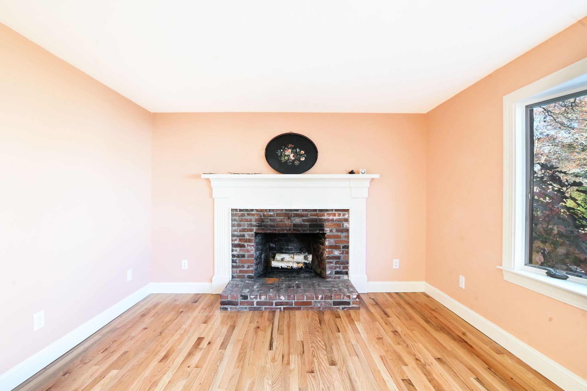 12 Crowell Road Sandwich, MA 02563 - Photo 12 of 49 a room with a fireplace and window
