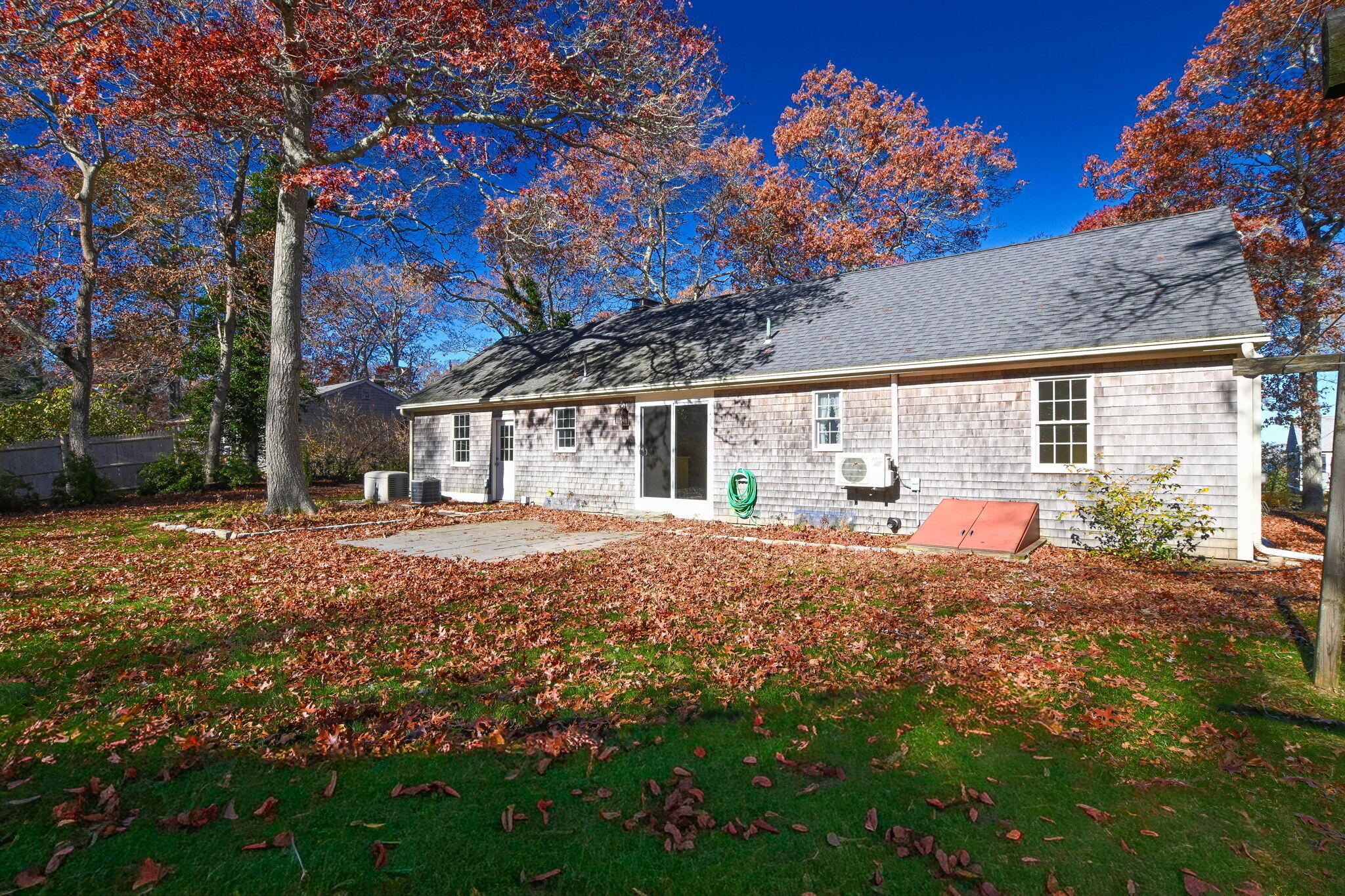 12 Crowell Road Sandwich, MA 02563 - Photo 41 of 49 a house view with a backyard space