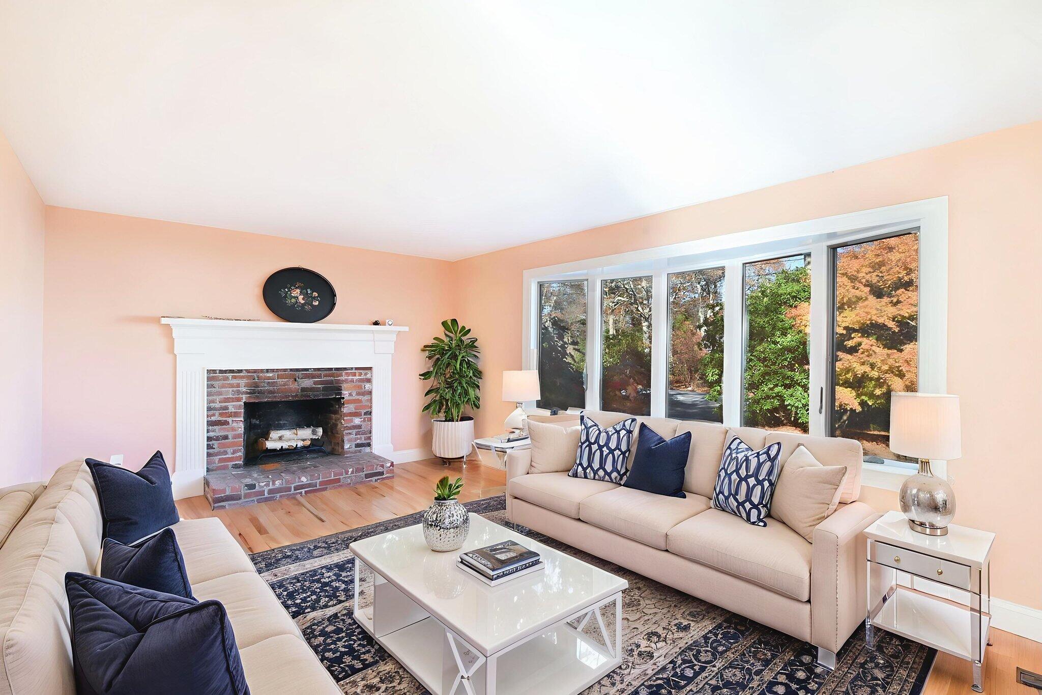 12 Crowell Road Sandwich, MA 02563 - Photo 7 of 49 a living room with furniture and a fireplace