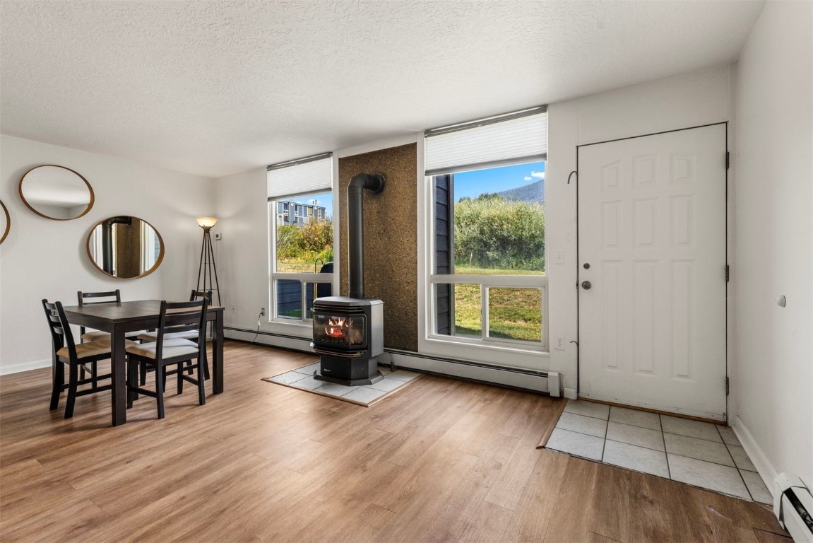 390 Straight Creek Drive, Unit 307 Dillon, CO 80435 - Photo 12 of 35 a living room with furniture and a large window