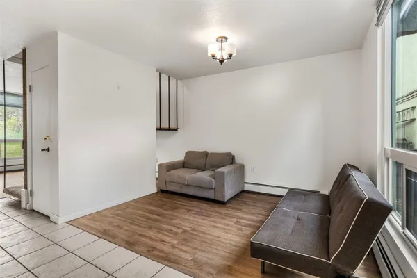 a living room with furniture and a couch