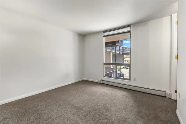 an empty room with windows