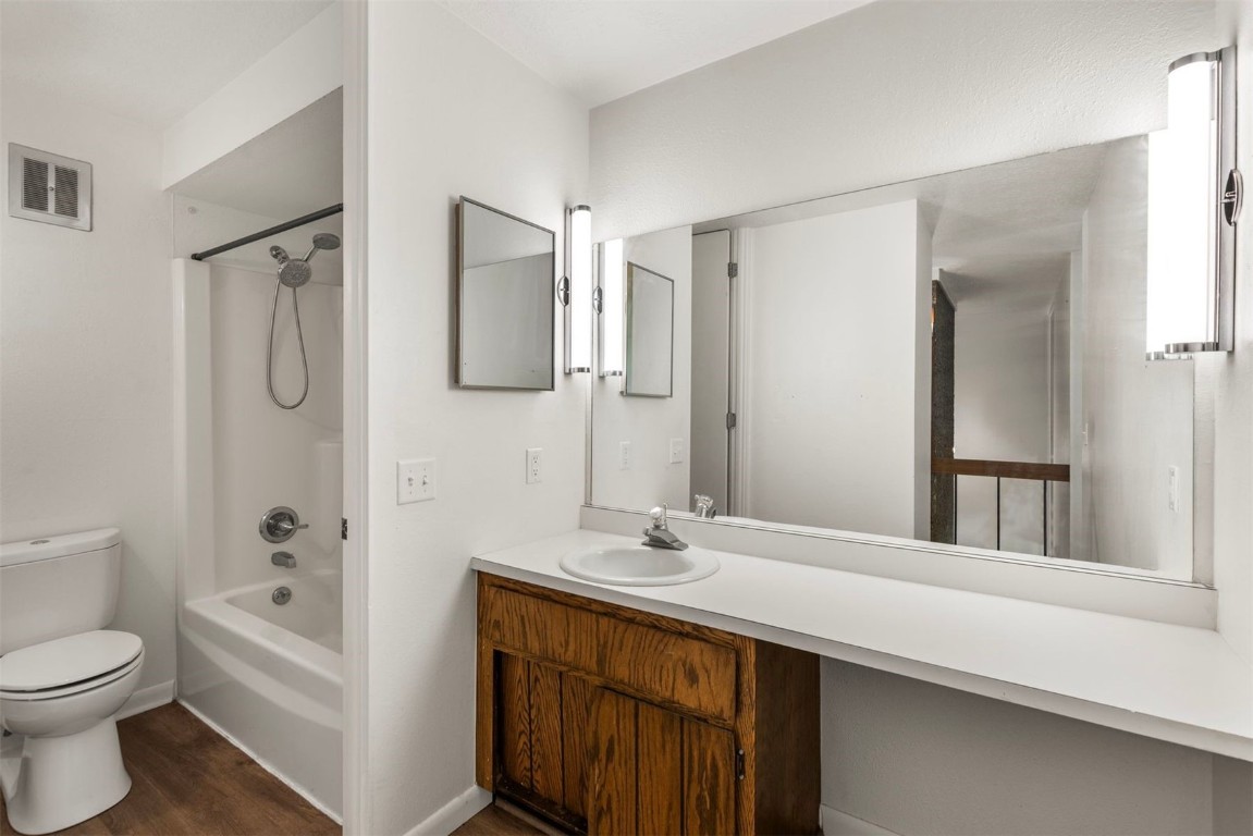 390 Straight Creek Drive, Unit 307 Dillon, CO 80435 - Photo 21 of 35 a bathroom with a sink a toilet and shower