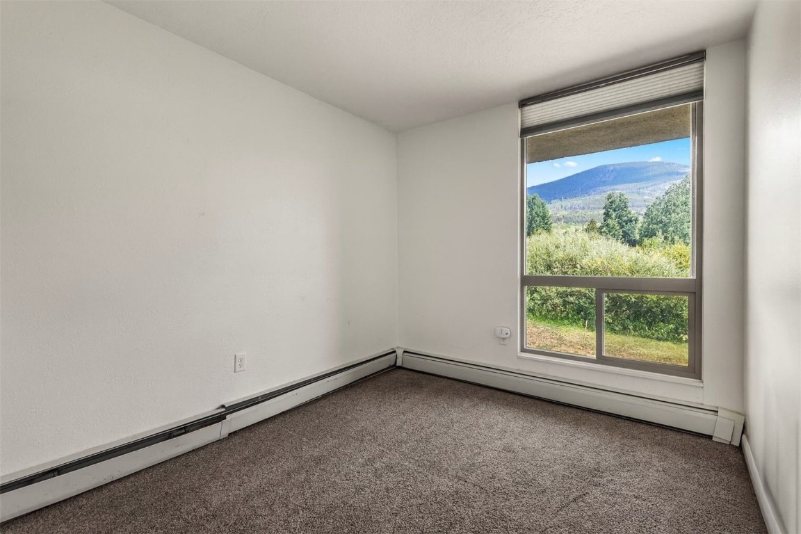 390 Straight Creek Drive, Unit 307 Dillon, CO 80435 - Photo 24 of 35 an empty room with a window