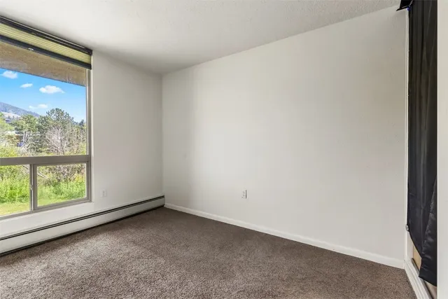 a view of a window in an empty room