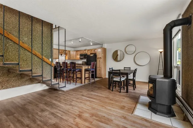 an outdoor space with seating space and view of a living room