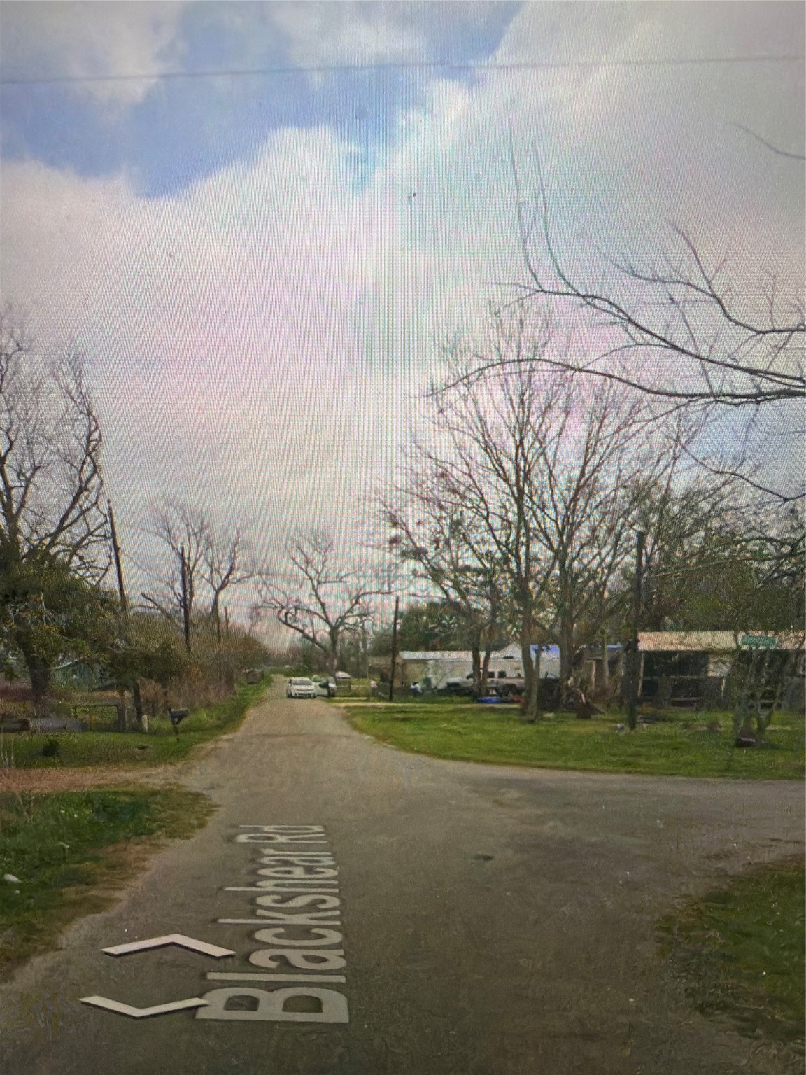 3221 Blackshear Road Wharton, TX 77488 - Photo 5 of 6 a view of a field with large trees