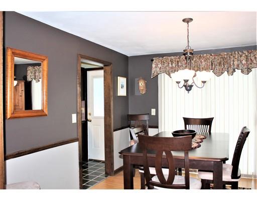 8 Meadowbrook Road Franklin, MA 02038 - Photo 6 of 11 a view of a dining room with furniture and chandelier