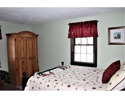8 Meadowbrook Road Franklin, MA 02038 - Photo 10 of 11 a bedroom with a bed and a window
