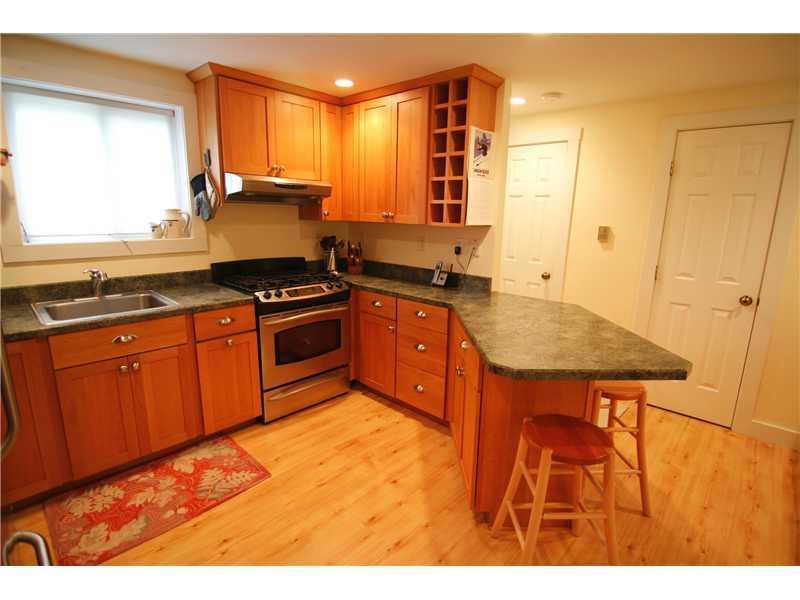 47 Spectator Road Ridge, Unit C2 Newry, ME 04261 - Photo 4 of 25 Kitchen. Kitchen with breakfast bar.