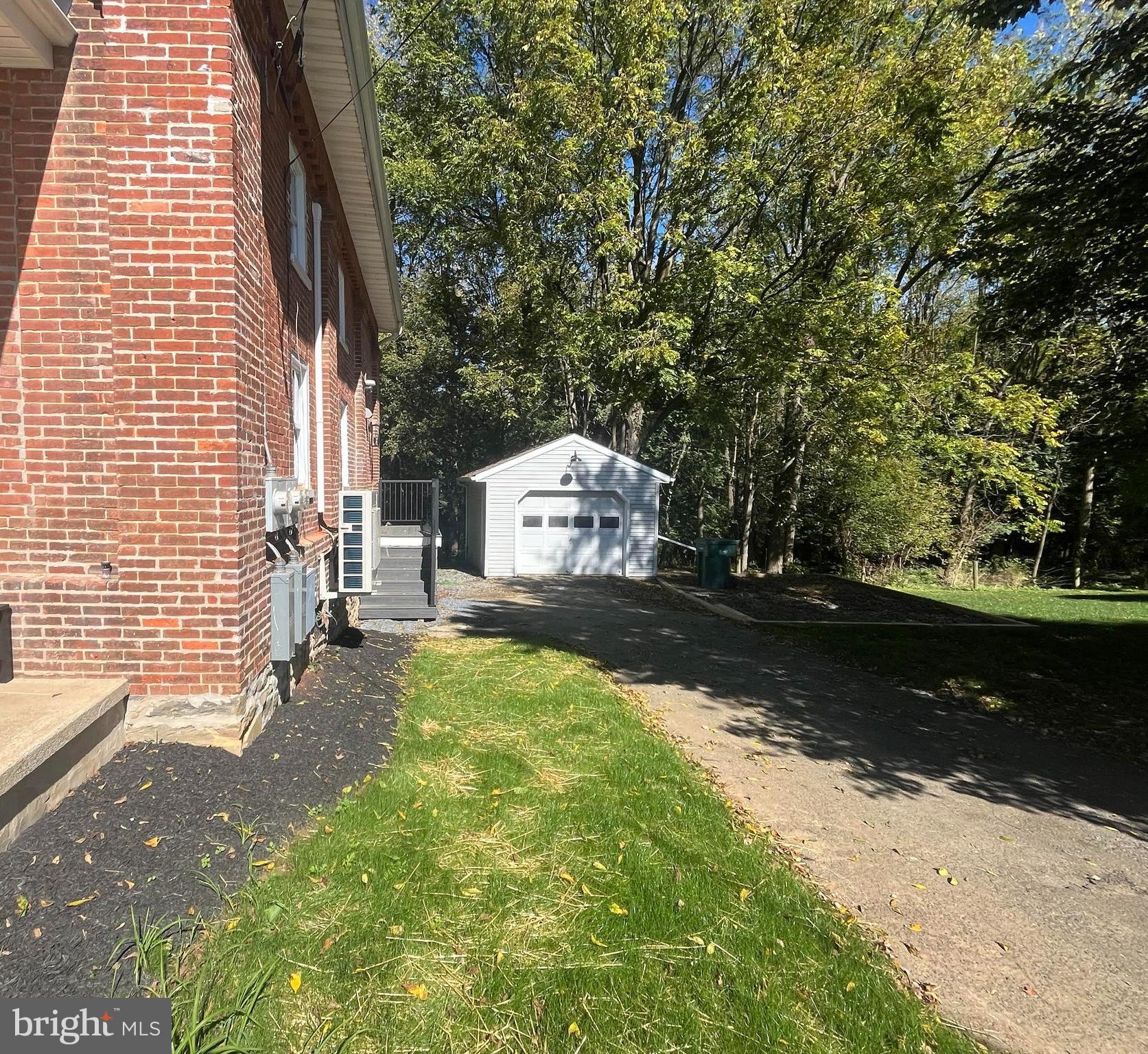 1355 Penn Grant Road, Unit 2 Strasburg, PA 17579 - Photo 11 of 13 a view of backyard with a garden