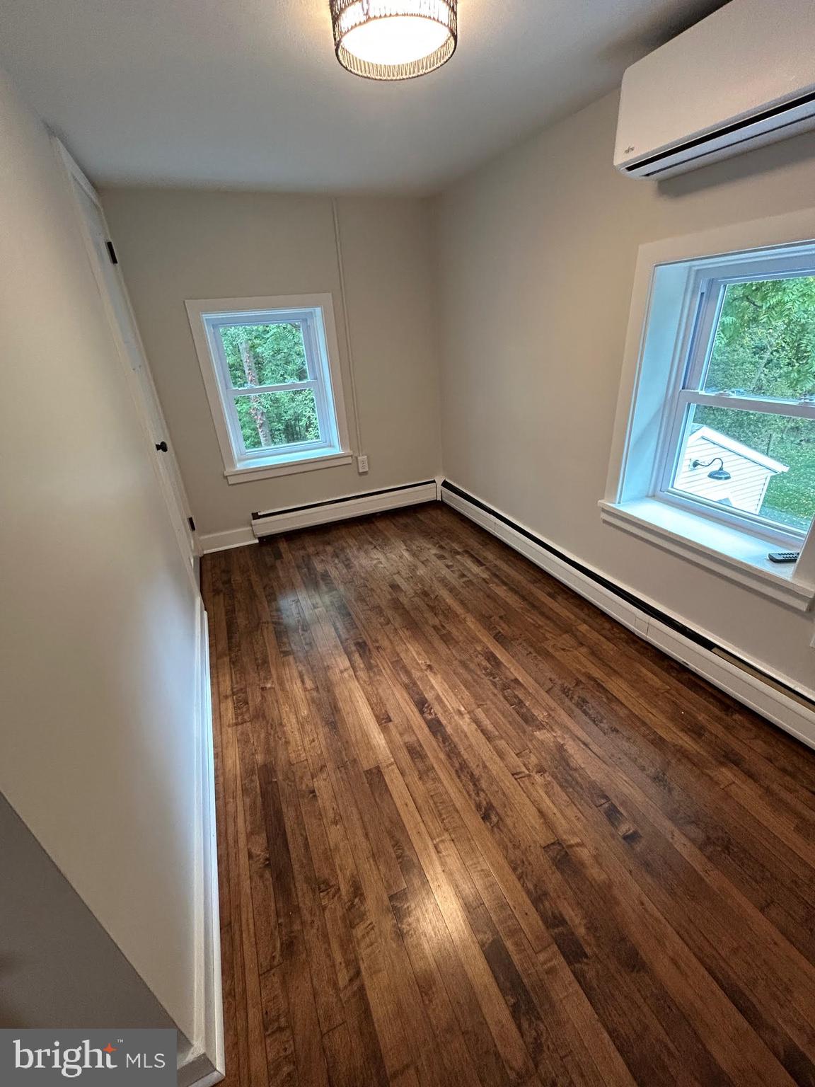 1355 Penn Grant Road, Unit 2 Strasburg, PA 17579 - Photo 6 of 13 a view of an empty room with a window