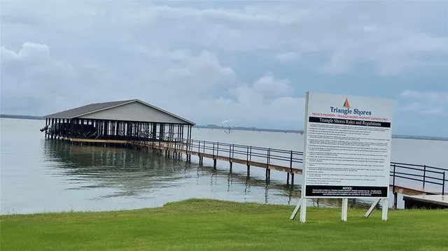 a swimming pool with barbeque oven