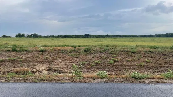 a view of a lake with a city