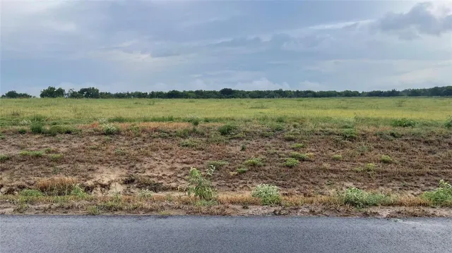 a view of a lake with a city