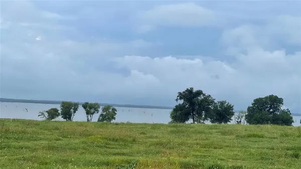 a yard with lots of green space