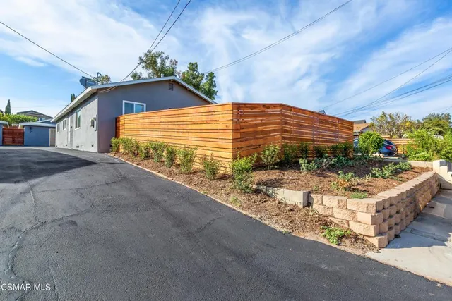 a view of house with an outdoor space