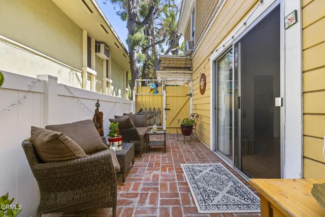 a balcony with furniture
