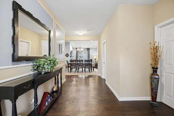 a hallway with wooden floor