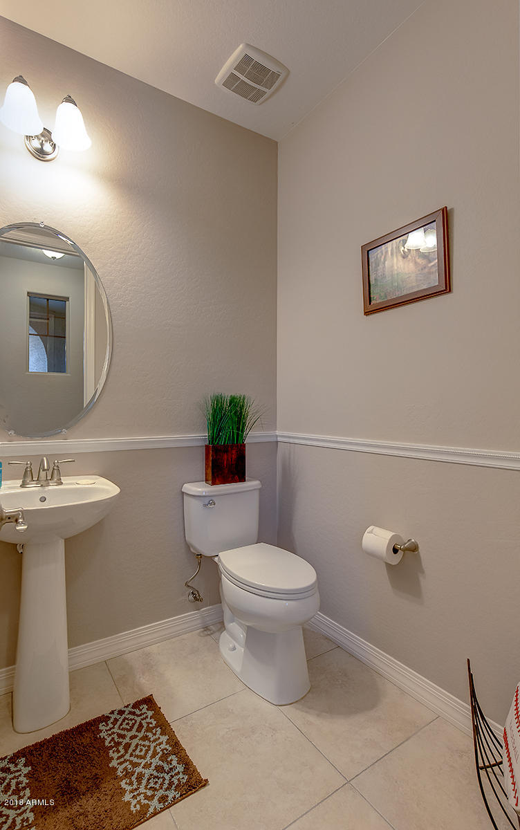 4432 North 155th Lane Goodyear, AZ 85395 - Photo 34 of 62 Half Bath Across from Drop Center