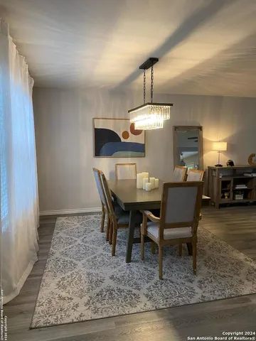 a view of a dining room with furniture