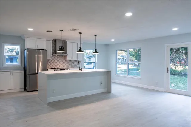 a bathroom with a sink a toilet and a bathtub