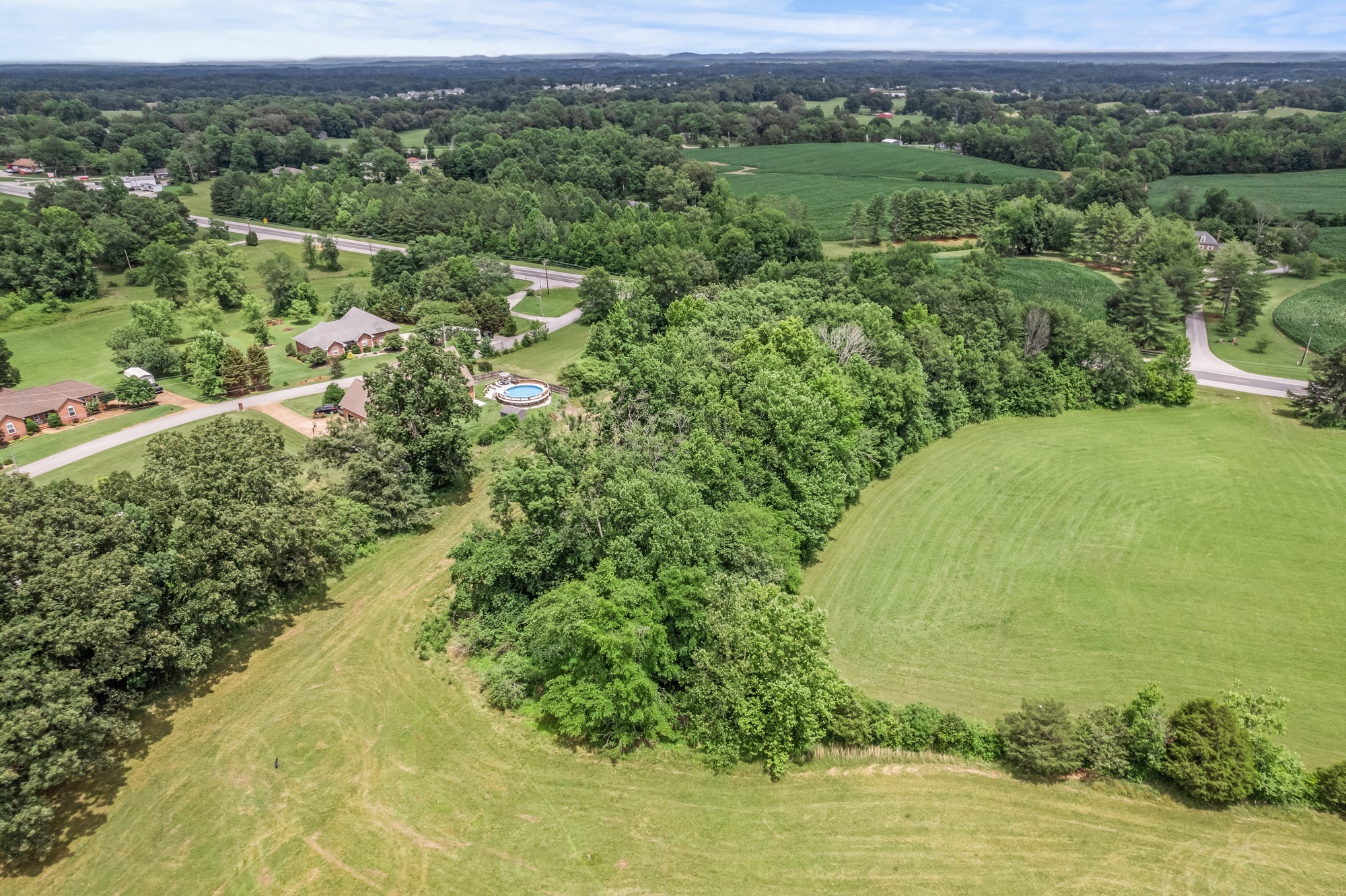 0 Hulon Ferrell Road Baxter, TN 38544 - Photo 11 of 25 an aerial view of a houses with a yard and lake view