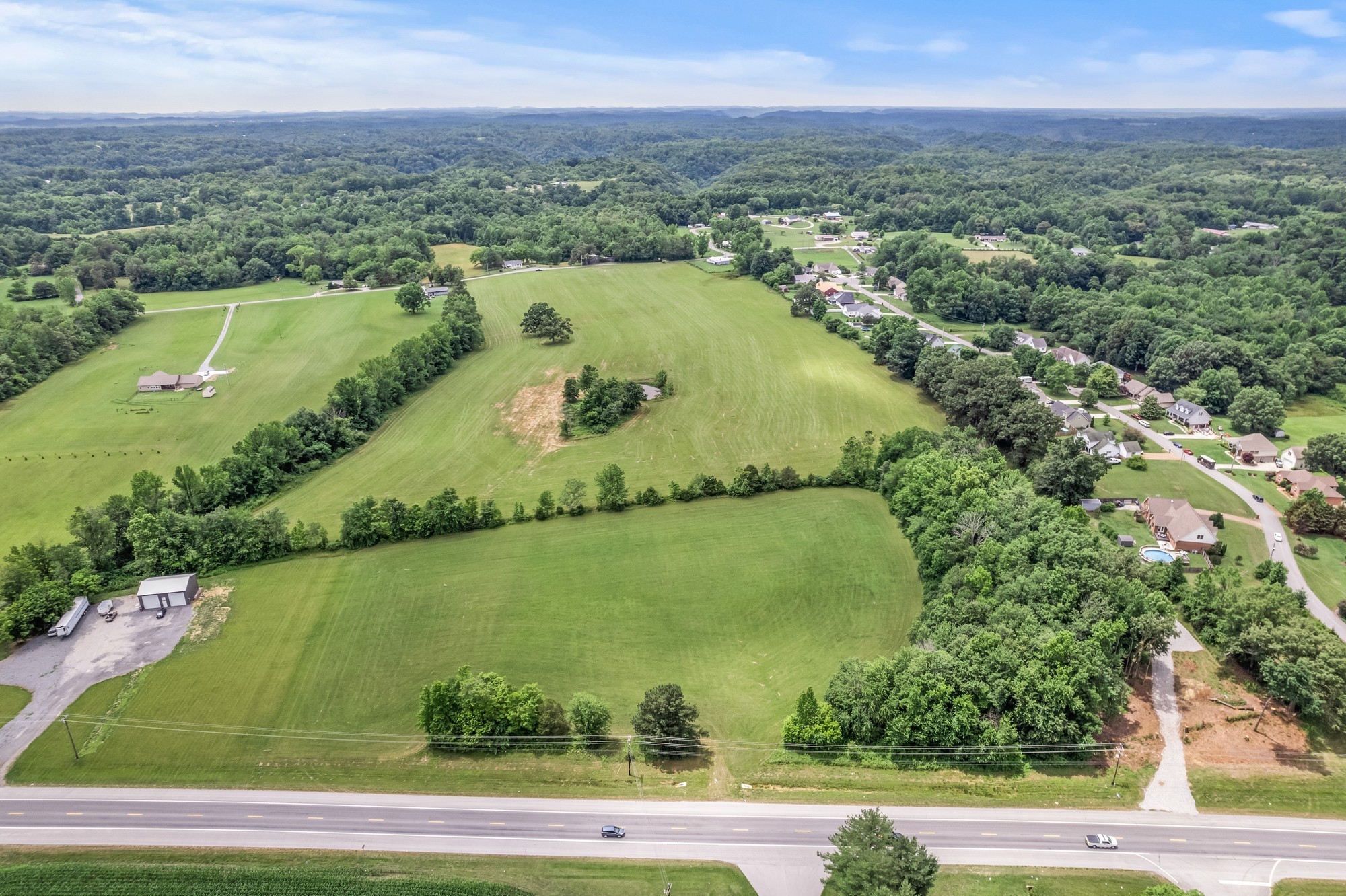 0 Hulon Ferrell Road Baxter, TN 38544 - Photo 13 of 25 an aerial view of a residential houses with outdoor space and river view
