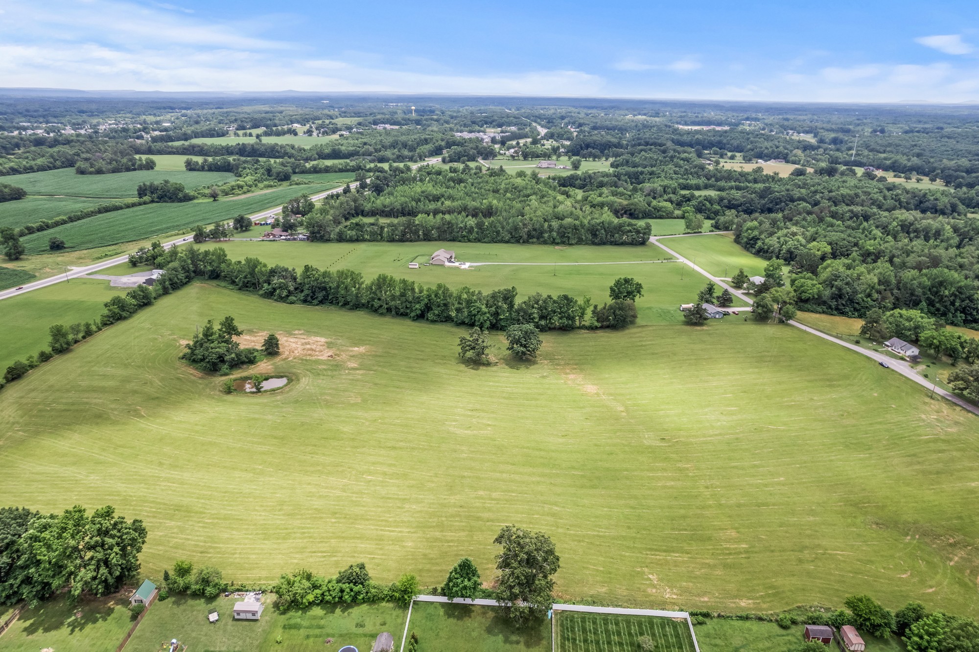 0 Hulon Ferrell Road Baxter, TN 38544 - Photo 18 of 25 a view of a lake with a city