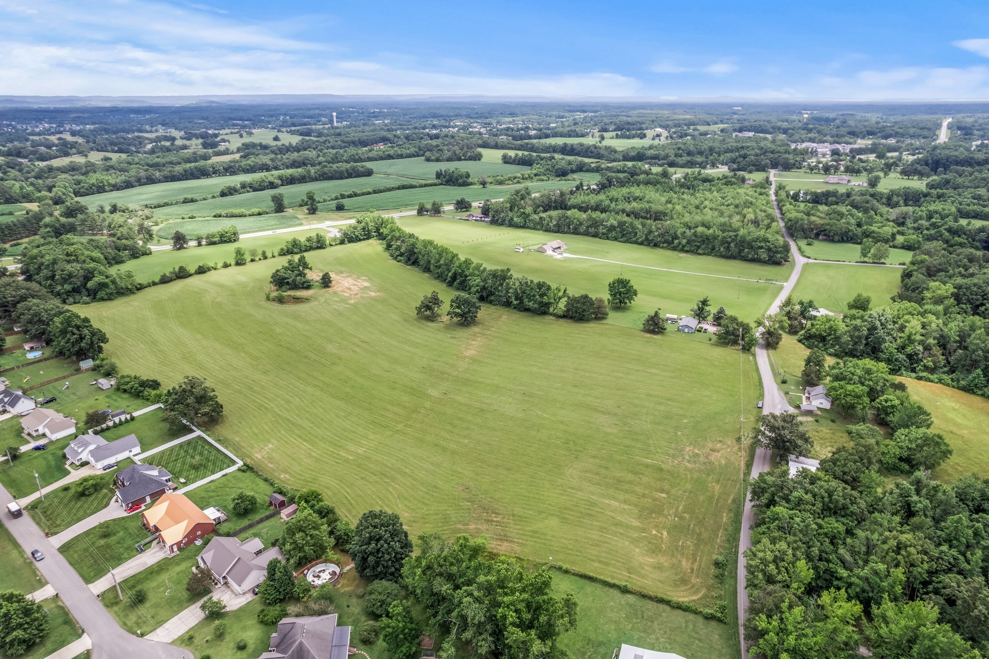 0 Hulon Ferrell Road Baxter, TN 38544 - Photo 19 of 25 an aerial view of ocean with residential houses with outdoor space and trees