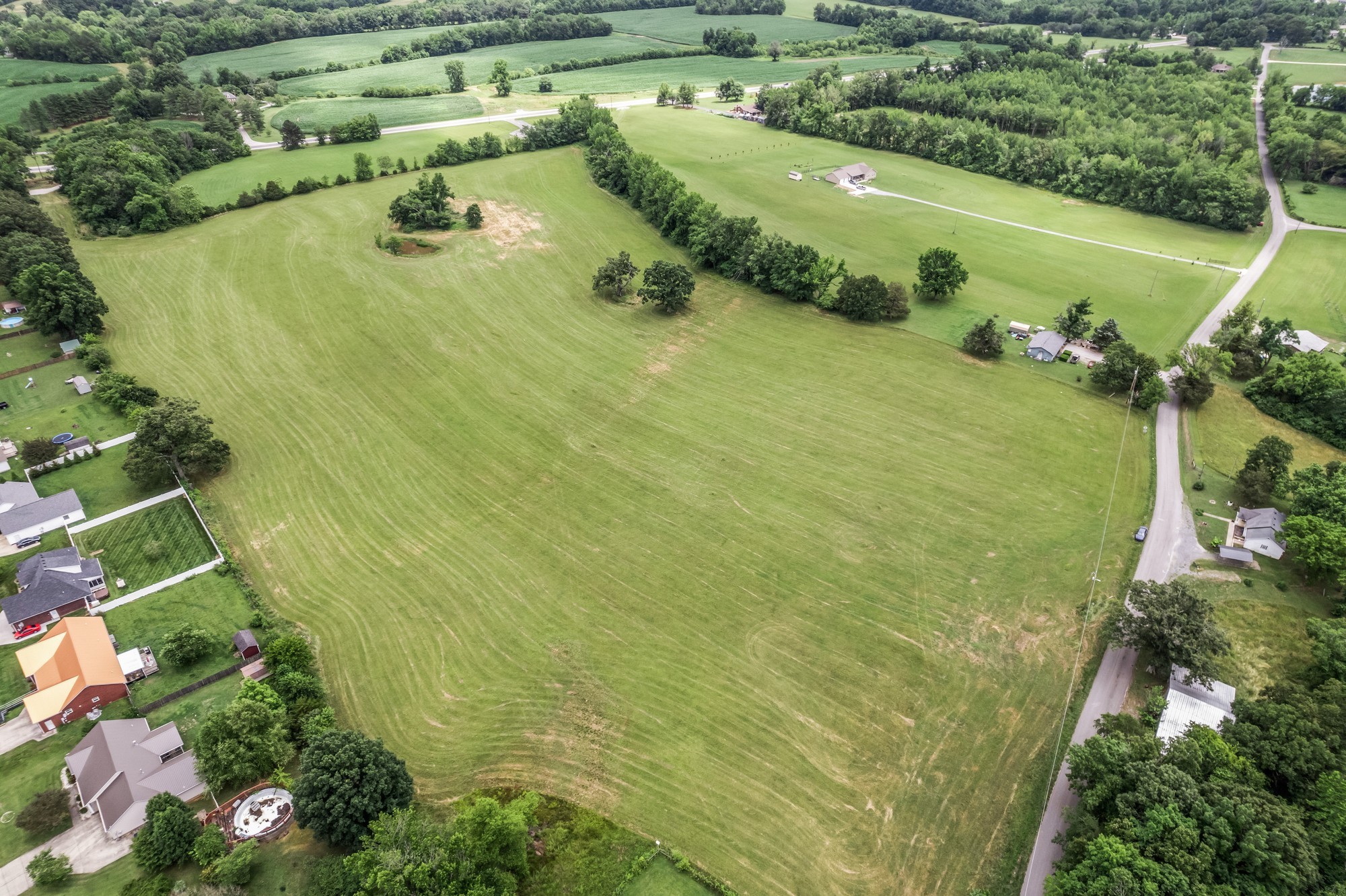 0 Hulon Ferrell Road Baxter, TN 38544 - Photo 20 of 25 a view of a lake with a yard