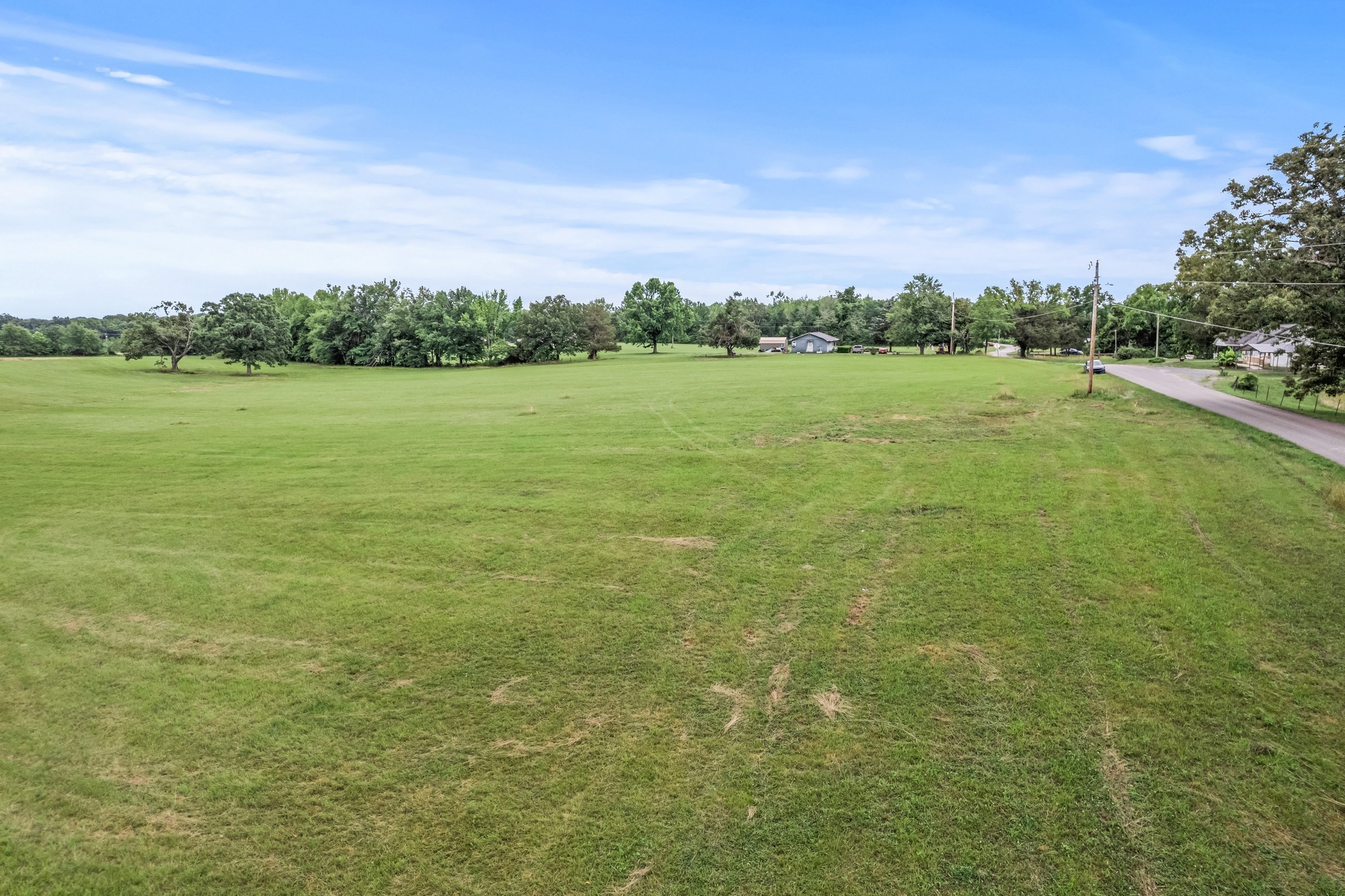 0 Hulon Ferrell Road Baxter, TN 38544 - Photo 2 of 25 a view of a lake with houses in the background