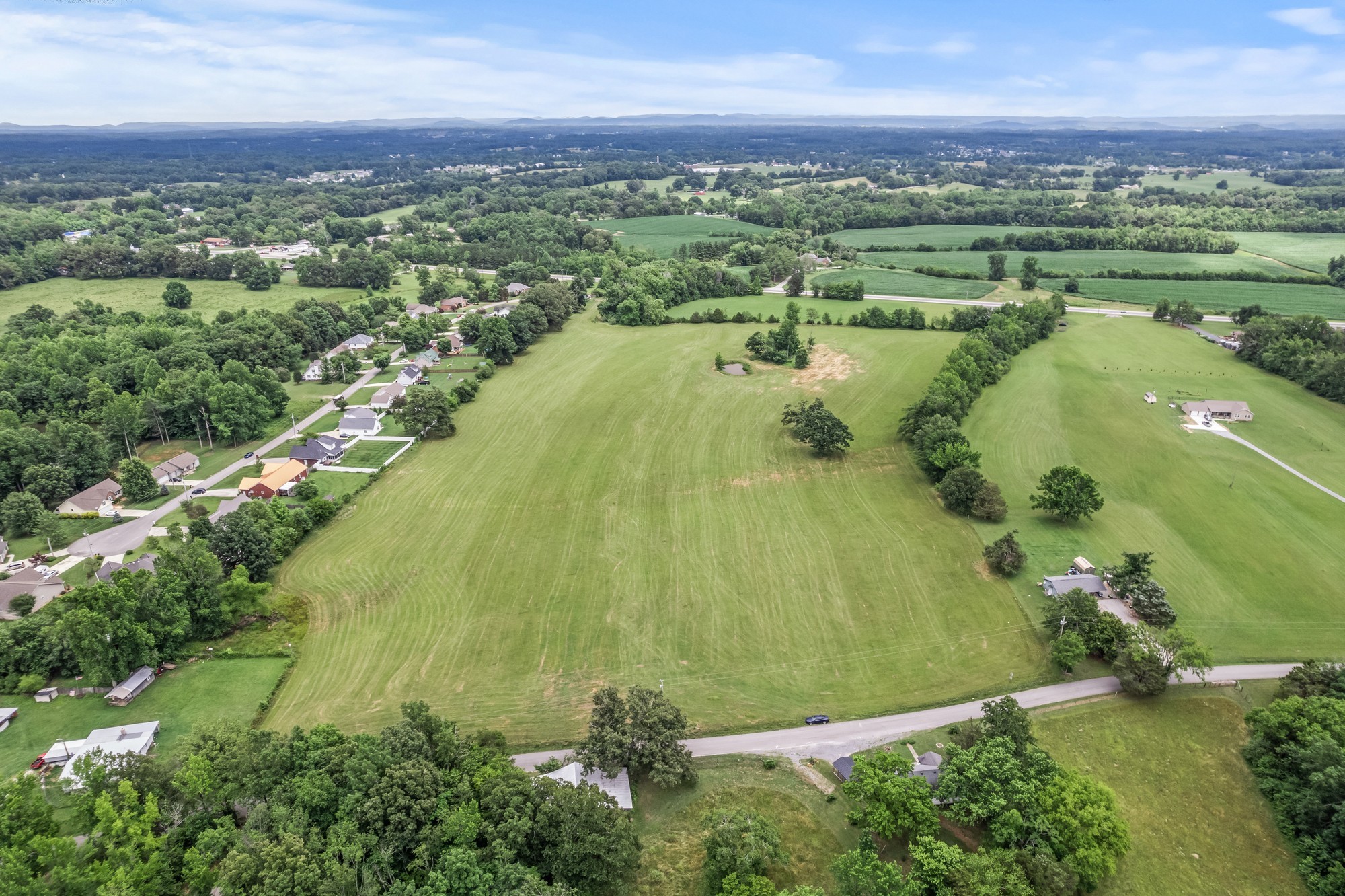 0 Hulon Ferrell Road Baxter, TN 38544 - Photo 22 of 25 an aerial view of lake residential houses with outdoor space and trees