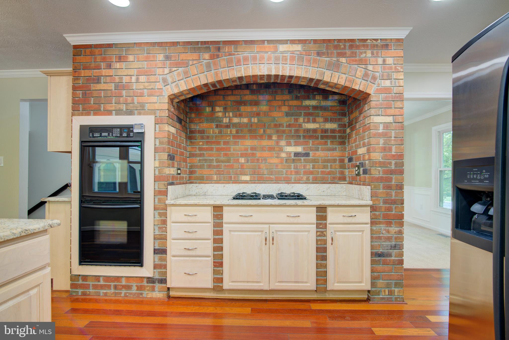 44 Carrollton Road Sterling, VA 20165 - Photo 16 of 75 Distinctive Brick Cooking Alcove; cooktop 2026