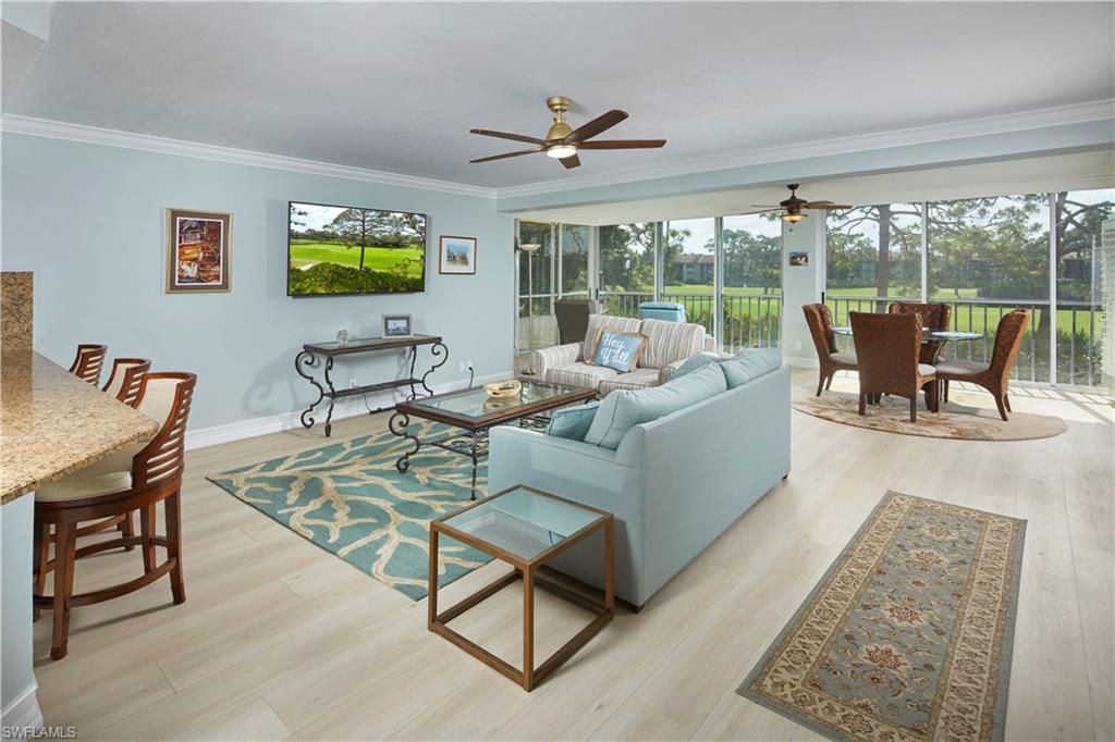 This open concept living space with wood look flooring, will be your Florida retreat!