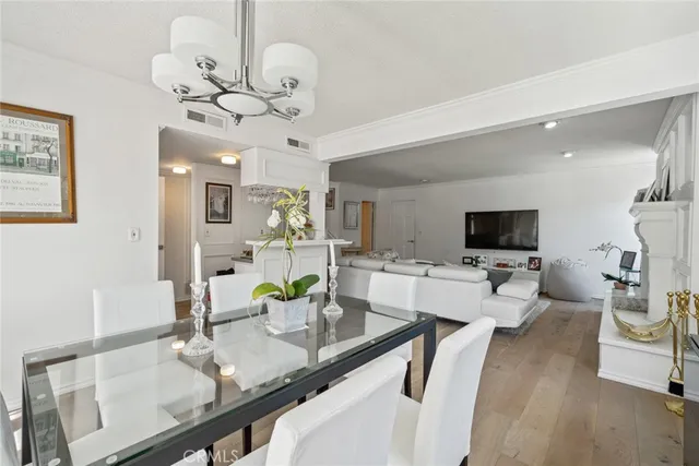 a kitchen with stainless steel appliances a stove microwave and a refrigerator