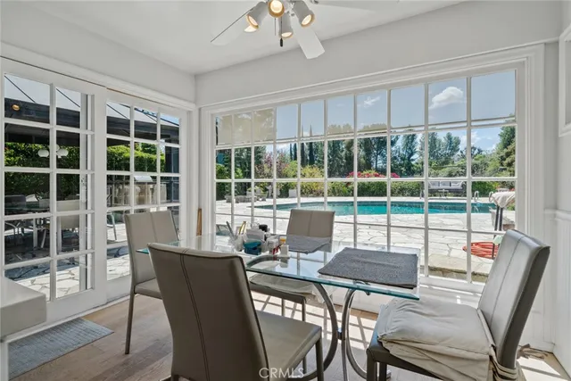 a large kitchen with sink and cabinets