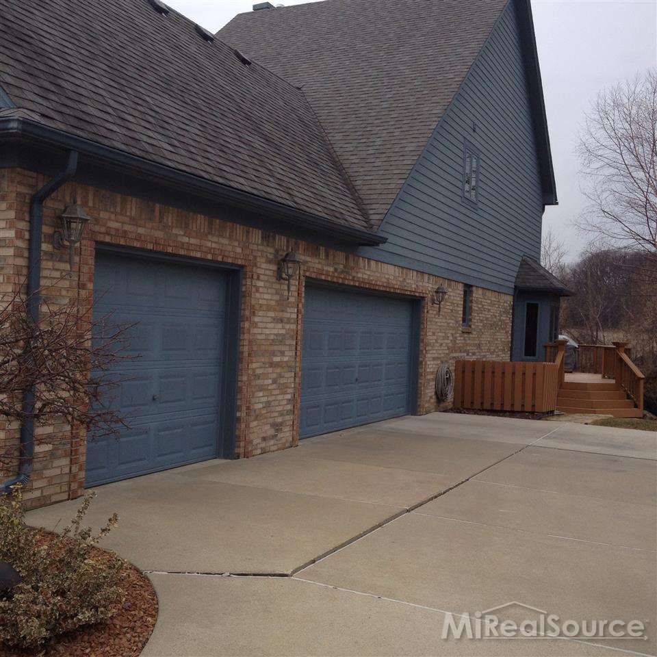 63863 Inverness Washington, MI 48095 - Photo 14 of 16 3 Car side turned Garage