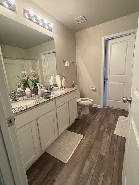 357 Indian Lake Trail Villa Rica, GA 30180 - Photo 15 of 26 a bathroom with a double vanity sink and a mirror