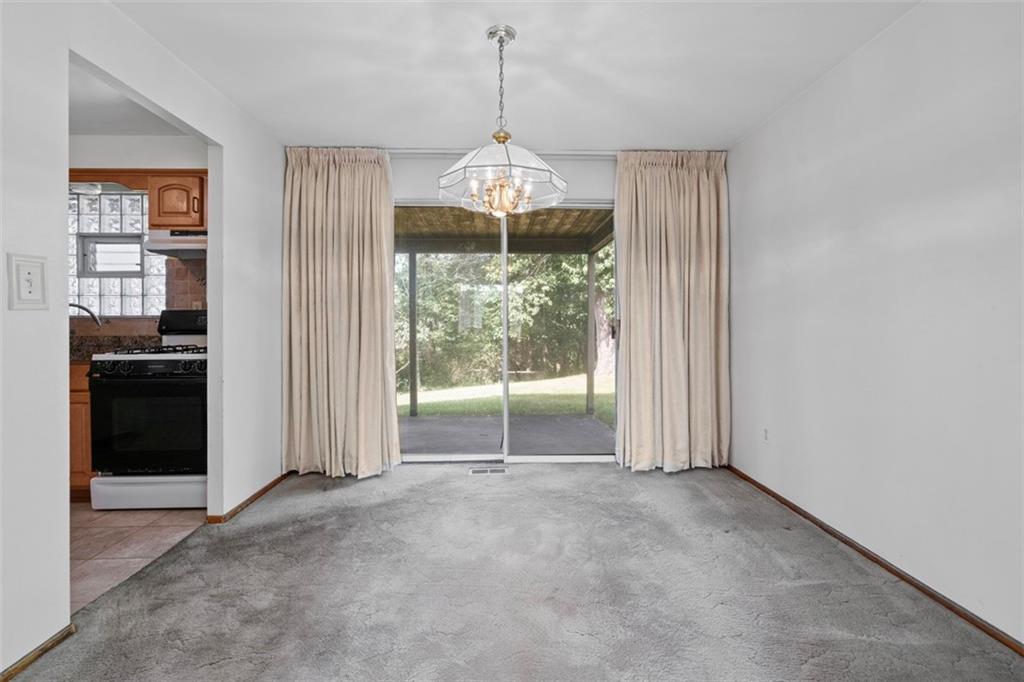 152 Malcolm Pittsburgh, PA 15214 - Photo 13 of 31 a view of a room with wooden floor chandeliers and kitchen