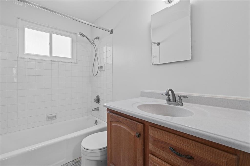 152 Malcolm Pittsburgh, PA 15214 - Photo 20 of 31 a bathroom with a sink a toilet and shower