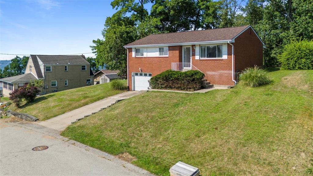 152 Malcolm Pittsburgh, PA 15214 - Photo 2 of 31 a front view of a house with a yard