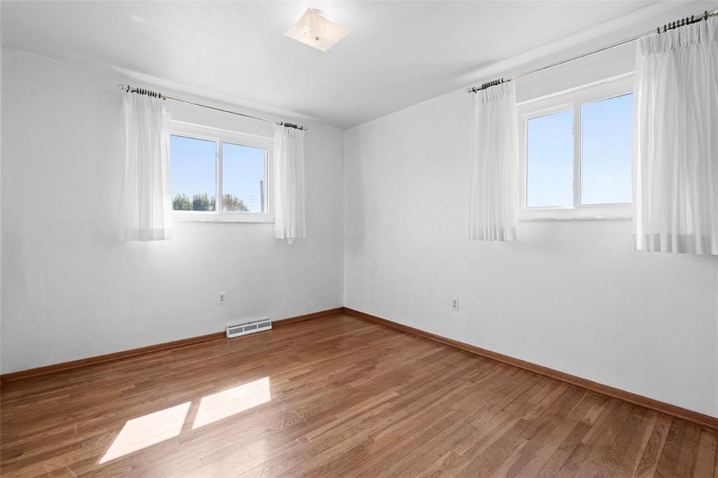 152 Malcolm Pittsburgh, PA 15214 - Photo 23 of 31 a view of empty room with wooden floor