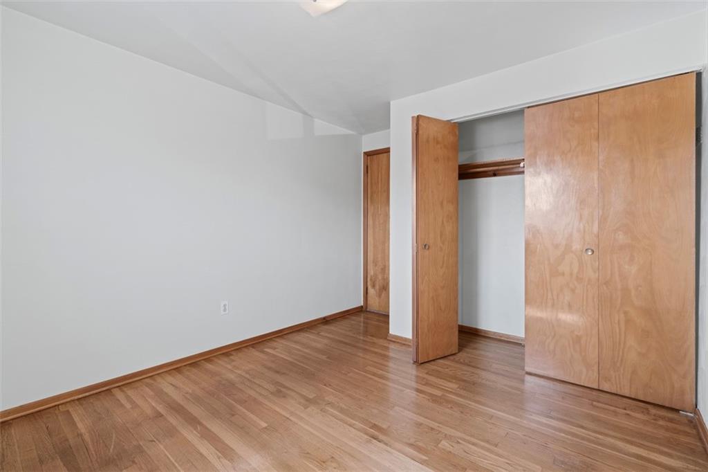 152 Malcolm Pittsburgh, PA 15214 - Photo 26 of 31 a view of an empty room with wooden floor and closet