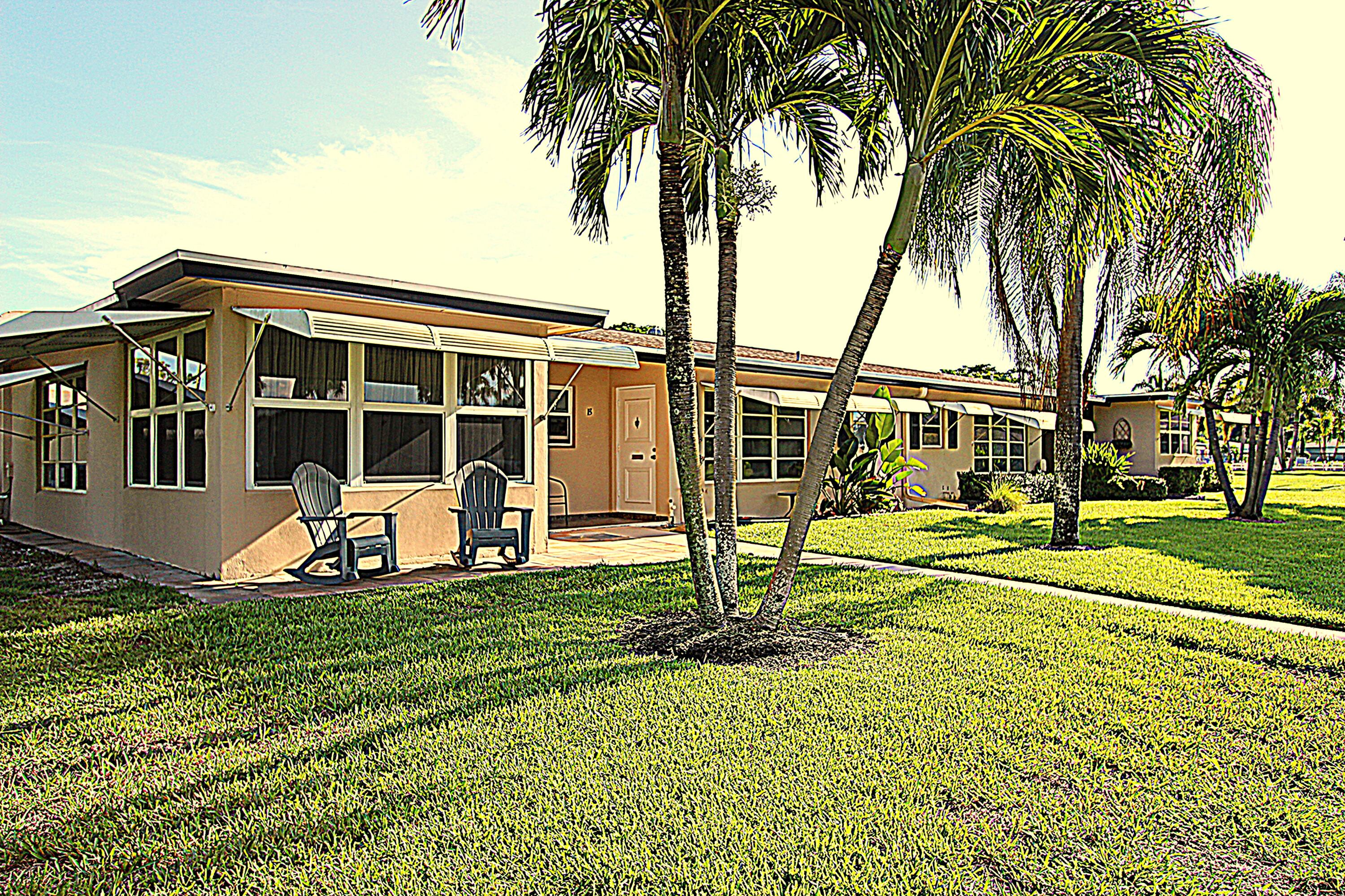 1045 East Circle Terrace, Unit B Delray Beach, FL 33445 - Photo 2 of 12 a view of a house with a backyard