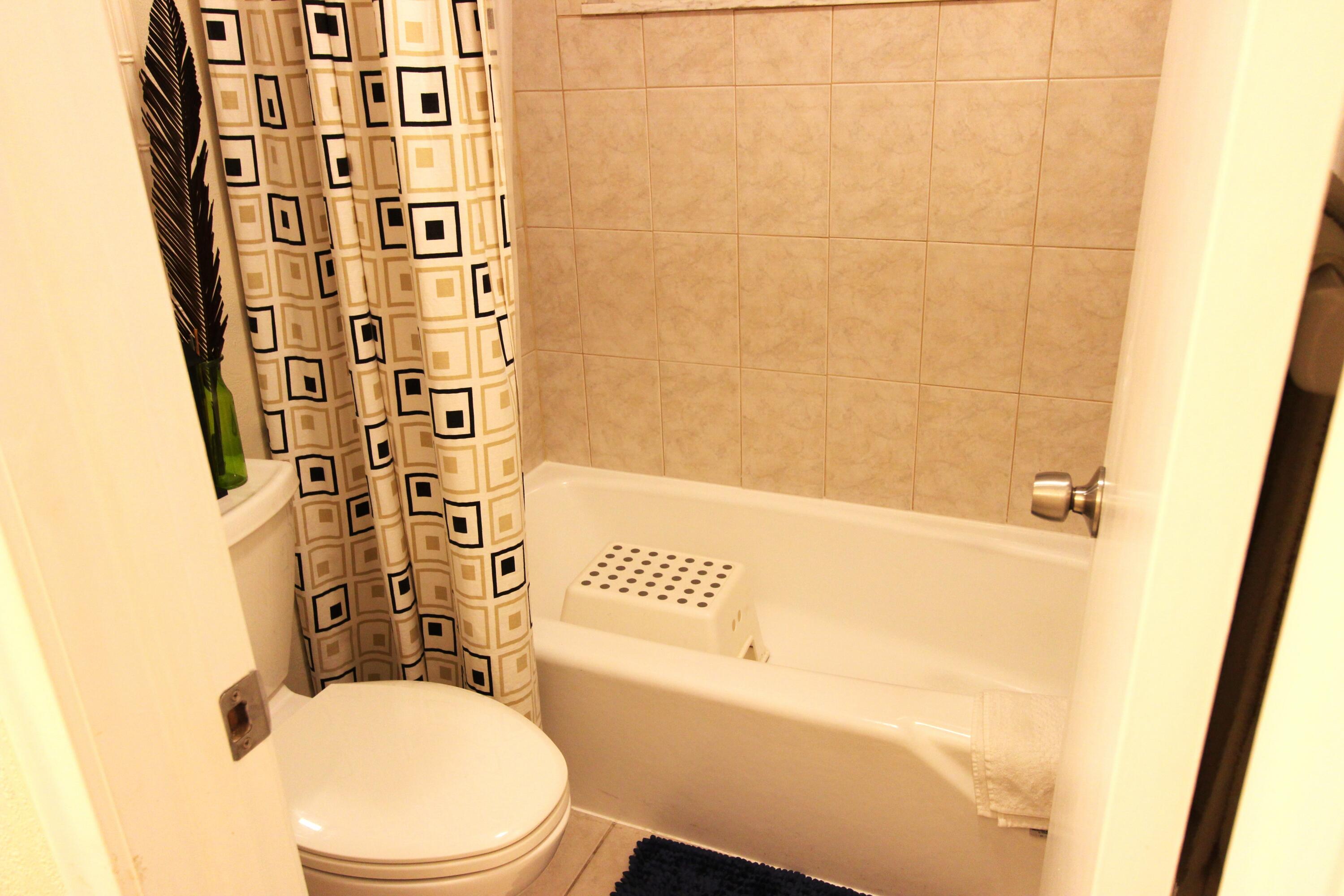 1045 East Circle Terrace, Unit B Delray Beach, FL 33445 - Photo 10 of 12 a bathroom with a bathtub and shower