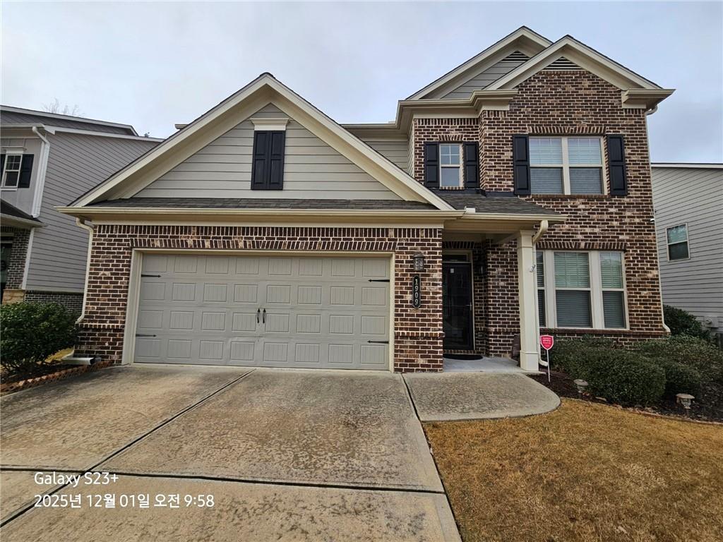 1909 Lakeview Bend Way Buford, GA 30519 - Photo 1 of 30 front view of a house